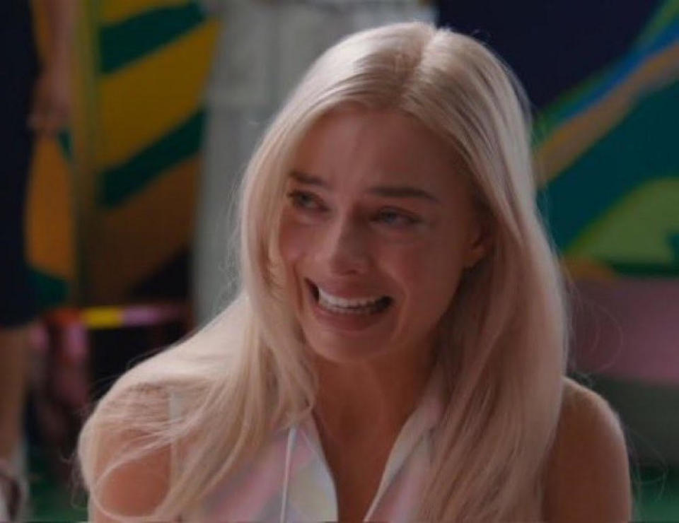 Closeup of Margot Robbie as Barbie crying