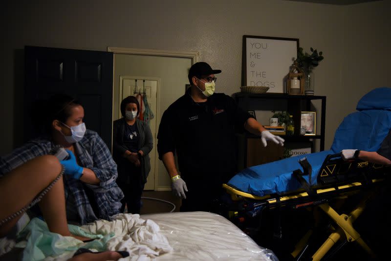 Wider Image: From home to hospital: giving birth during the U.S. coronavirus outbreak