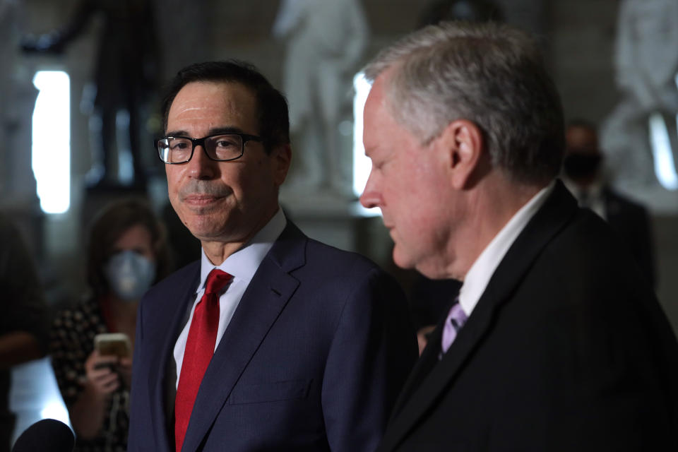 WASHINGTON, DC - AUGUST 07:  White House Chief of Staff Mark Meadows and Secretary of the Treasury Steven Mnuchin speak to members of the press after a meeting at the office of Speaker of the House Rep. Nancy Pelosi (D-CA) at the U.S. Capitol August 7, 2020 in Washington, DC. Negotiations between Treasury Secretary Steven Mnuchin, Speaker of the House Rep. Nancy Pelosi, Senate Minority Leader Sen. Chuck Schumer and White House Chief of Staff Mark Meadows on how to move forward on a new relief package to help people and businesses weather the COVID-19 pandemic didn’t reach to a deal after the meeting today at the U.S. Capitol. (Photo by Alex Wong/Getty Images)