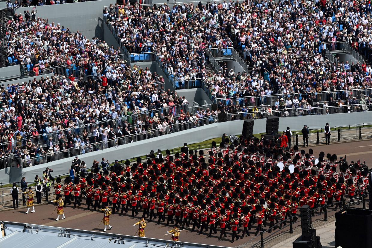 Members of the Household Division Foot Guards' bands march back along The Mall towards Buckingham Palace during Trooping The Colour on June 2, 2022, in London, England.