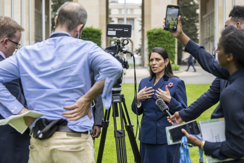 Britain's Home Secretary Priti Patel speaks during an interview with the Associated Press at the European headquarters of the United Nations in Geneva, Switzerland, Thursday, May 19, 2022. (Martial Trezzini/Keystone via AP)