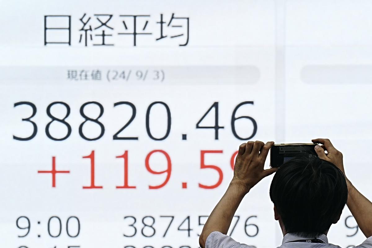 Asian markets are trading mixed as investors wait for key US jobs report