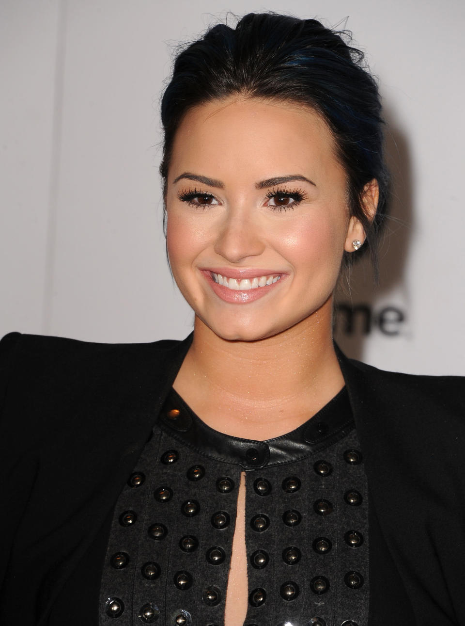 BEVERLY HILLS, CA - DECEMBER 11:  Demi Lovato arrives at the The Hollywood Reporter's Women In Entertainment Breakfast Honoring Oprah Winfrey at Beverly Hills Hotel on December 11, 2013 in Beverly Hills, California.  (Photo by Steve Granitz/WireImage)