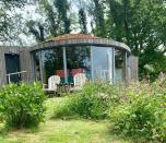 <p>Set in native woodland within the UK’s largest forest, which also has Dark Sky Park status, this bespoke and stylish eco dwelling for two has vast panoramic windows ensuring sunset views of Wigtown Bay from the double bed, plus a log-burning stove and a handy kitchenette. </p><p>Part of a working farm, it’s within strolling distance of Mossyard Beach and Carsluith Castle and handy for Kirroughtree Mountain Biking Centre. </p><p><a class="link " href="https://www.booking.com/hotel/gb/unique-roundhouse-with-fabulous-coastal-views.en-gb.html?aid=2070935&label=forest-getaways" rel="nofollow noopener" target="_blank" data-ylk="slk:CHECK AVAILABILITY;elm:context_link;itc:0;sec:content-canvas">CHECK AVAILABILITY</a></p>