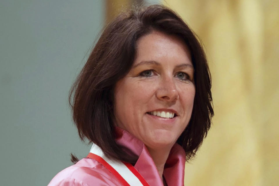 FILE - Daniele Sauvageau smiles after being presented with the Order of Canada during a ceremony in Ottawa, Friday May 3, 2013. Former Team Canada coach Daniele Sauvageau and retired United States national team captain Natalie Darwitz lead a list of four women and two men named general managers of the newly established Professional Women's Hockey League's Original Six franchises, Friday, Sept. 1, 2023. (Adrian Wyld/Canadian Press via AP)