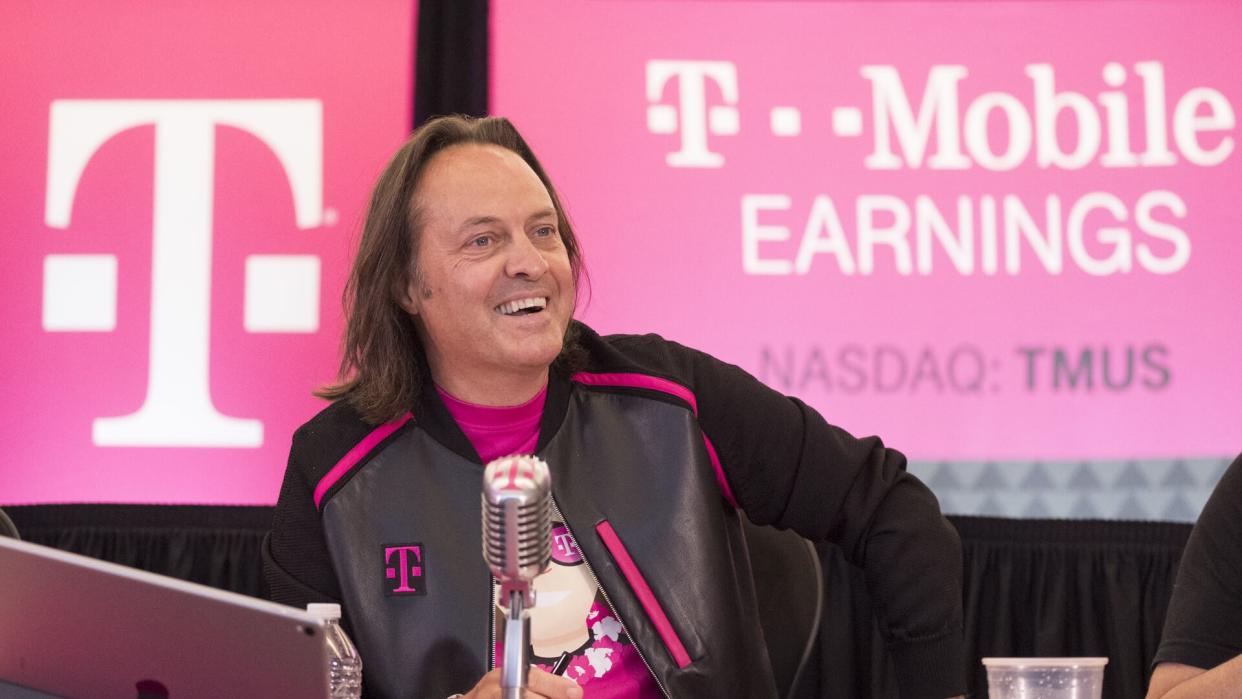 Mandatory Credit: Photo by AP/REX/Shutterstock (8966486a)T-Mobile President and CEO John Legere answers questions during the T-Mobile Q2 earnings call, in Bellevue, Wash.
