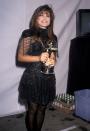 <p>Paula Abdul‘s look for the 1989 VMAs had fringe maid of black metal chains.</p>