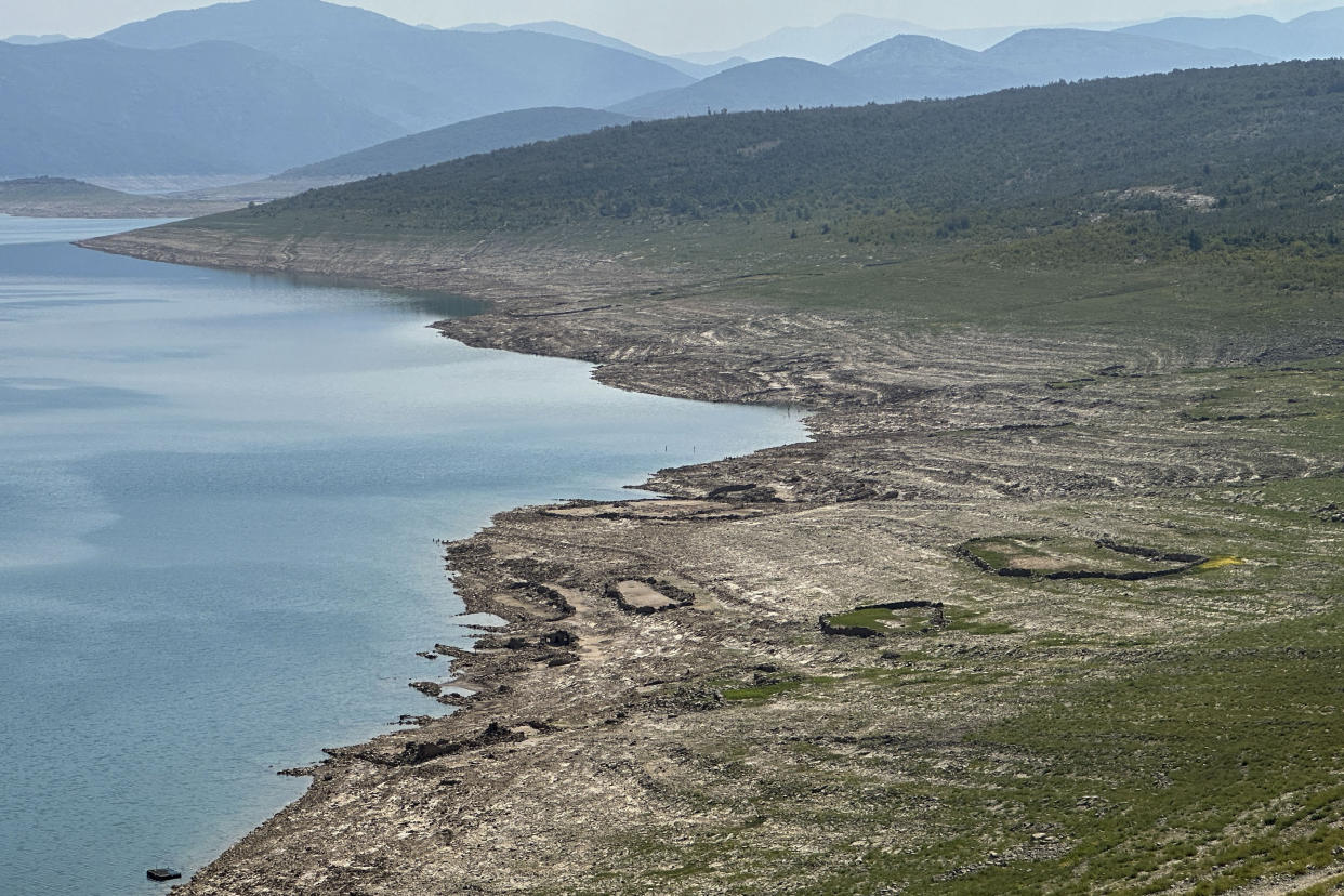 The dried out Bileca lake, near the town of Bileca, Bosnia, Thursday, Sept. 5, 2024. Experts say the summer of 2024 in the Balkans was the hottest since measurements started more than 130 years ago. (AP Photo/Eldar Emric)