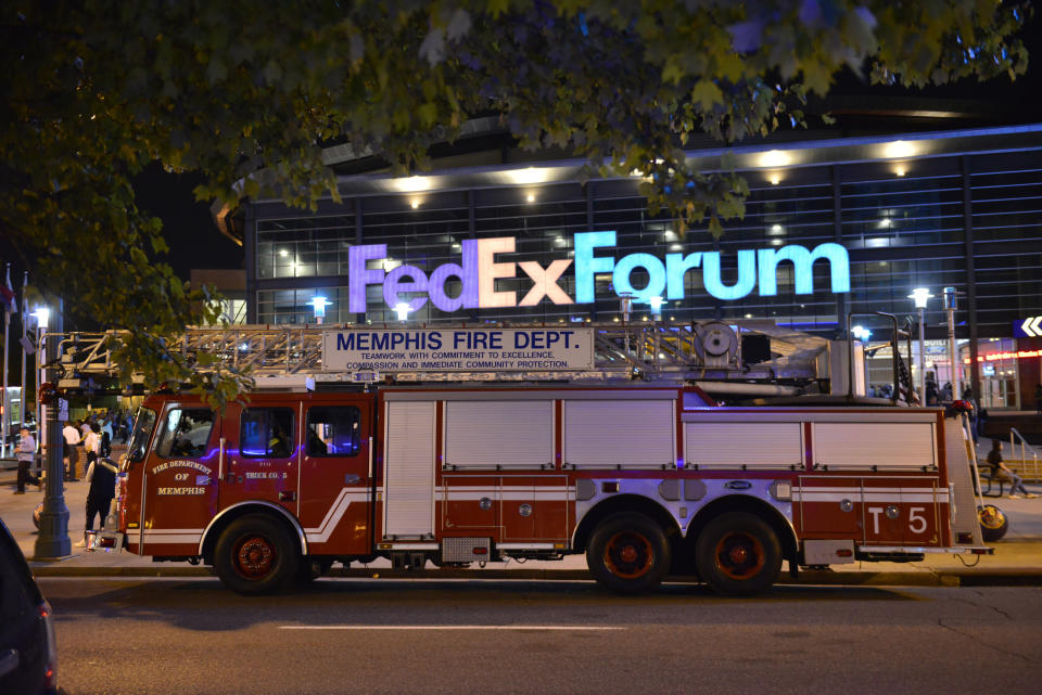 A fire truck is parked outside FedExForum after a fire alarm went off during an NBA preseason basketball game between the Milwaukee Bucks and the Memphis Grizzlies Tuesday, Oct. 5, 2021, in Memphis, Tenn. (AP Photo/Brandon Dill)