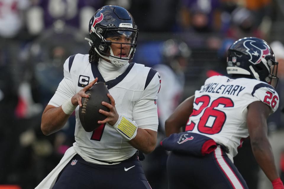 Houston Texans quarterback C.J. Stroud (7) drops back to pass against the Baltimore Ravens.