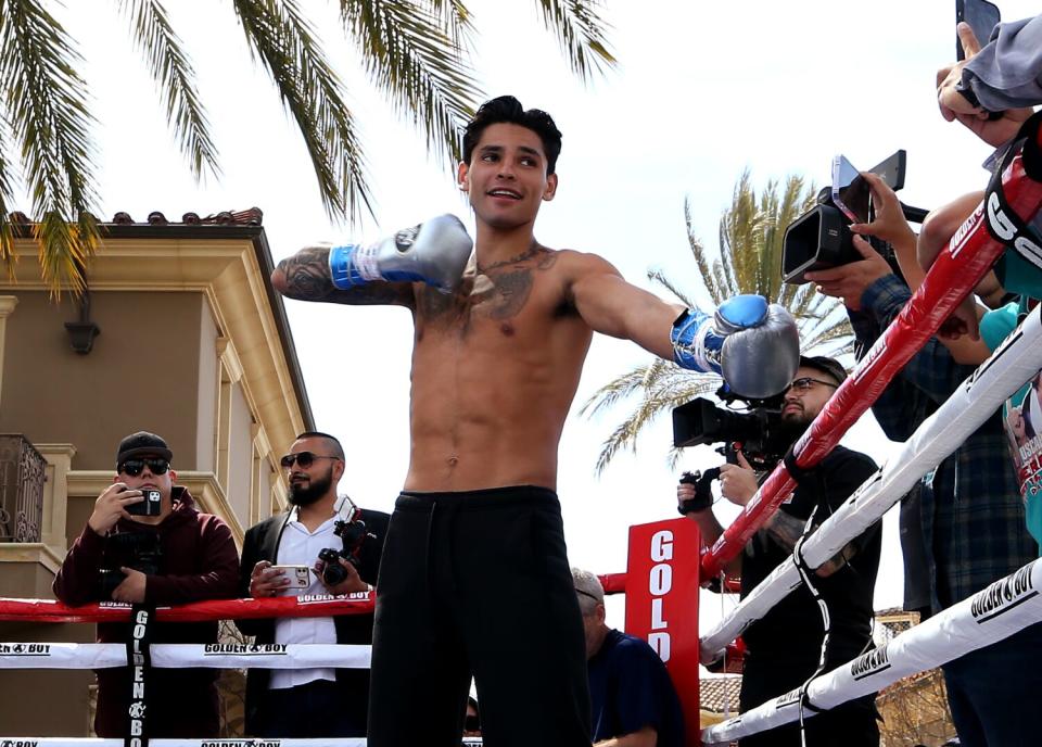 Boxer Ryan Garcia talks with members of the press during his media day event