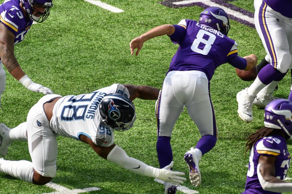 Tennessee Titans defensive tackle Jeffery Simmons (98) sacks Minnesota Vikings quarterback Kirk Cousins (8) on Sept. 27, 2020, in Minneapolis.