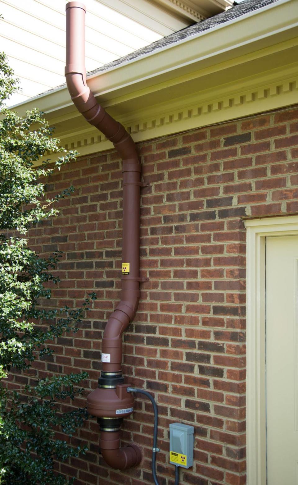 This device vents radon out of a home. Photo by Mark Mahan