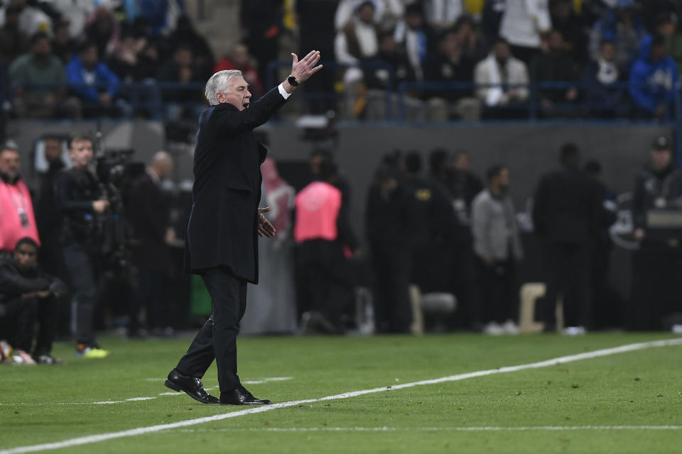 Real Madrid's head coach Carlo Ancelotti shouts instructions from the touchline during the Spanish Super Cup semi final soccer match between Real Madrid and Atletico Madrid at Al Awal Park Stadium in Riyadh, Saudi Arabia, Wednesday, Jan. 10, 2024. (AP Photo)