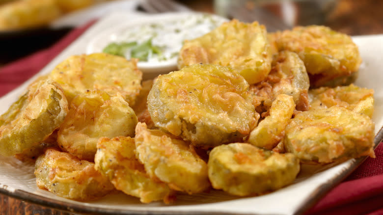 fried pickle chips on plate