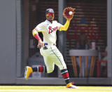 Atlanta Braves outfielder Ronald Acuna catches a fly ball by Pittsburgh Pirates during the ninth inning of a baseball game Sunday, May 23, 2021, in Atlanta. (Curtis Compton/Atlanta Journal-Constitution via AP)