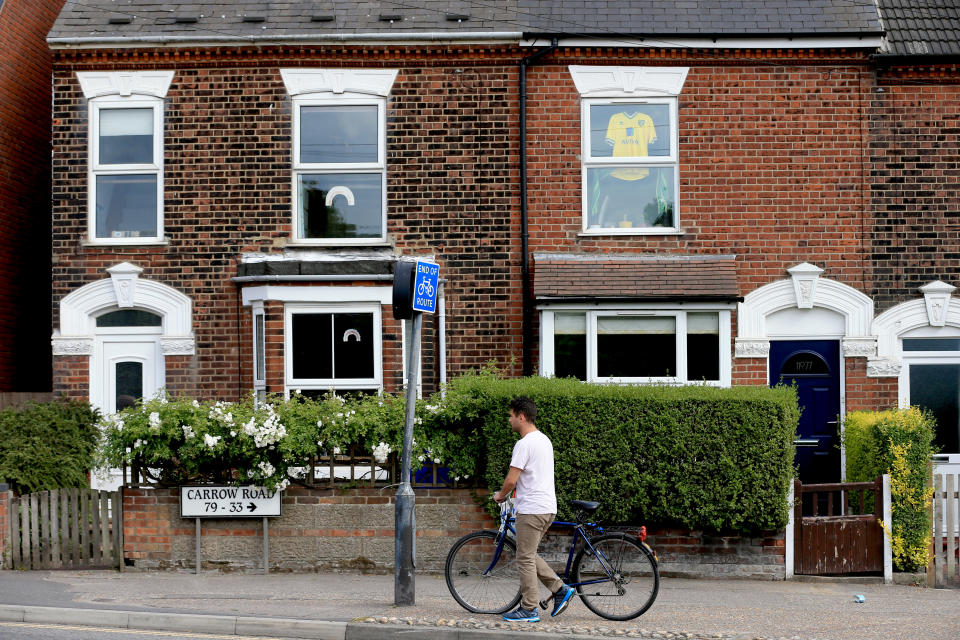 NORWICH, ENGLAND - JUNE 19:  A Norwich City shirt is displayed in the window of a house ahead of the Premier League match between Norwich City and Southampton FC at Carrow Road on June 19, 2020 in Norwich, England. (Photo by Stephen Pond/Getty Images)