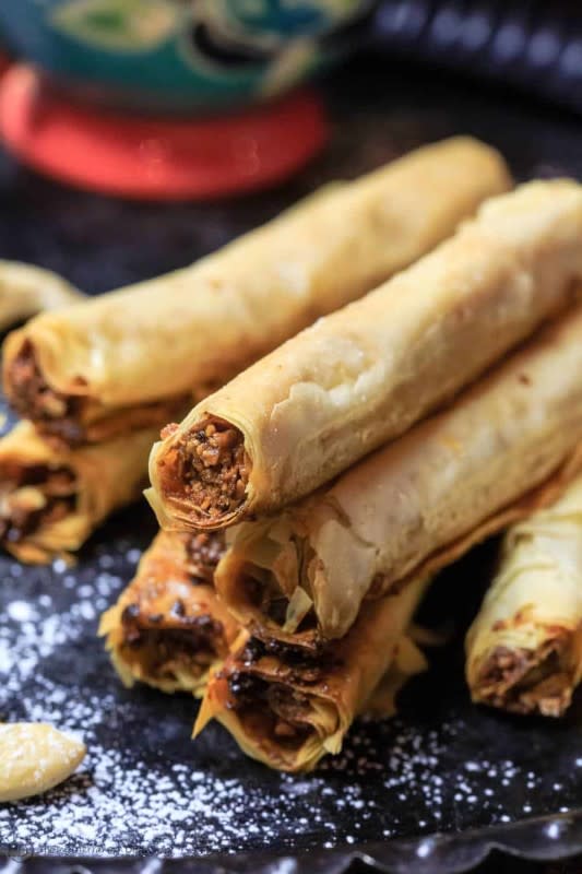 <p>A fun take on baklava, these baklava rolls—filled with a spiced cashew mixture, make the perfect dessert for your next party! Be sure to see the easy step-by-step tutorial below the recipe.</p><p><strong>Get the recipe: <a href="https://www.themediterraneandish.com/cashew-filled-baklava-rolls/" rel="nofollow noopener" target="_blank" data-ylk="slk:Cashew Filled Baklava Rolls;elm:context_link;itc:0;sec:content-canvas" class="link ">Cashew Filled Baklava Rolls</a></strong></p>