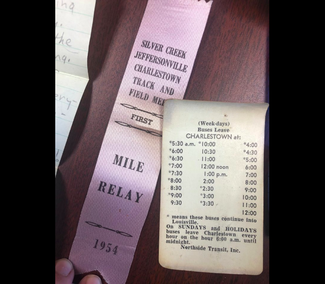 Items found in Marty Ingham’s lost purse included a track-and-field ribbon and a bus schedule. (Photo: Greater Clark County Schools via Facebook)