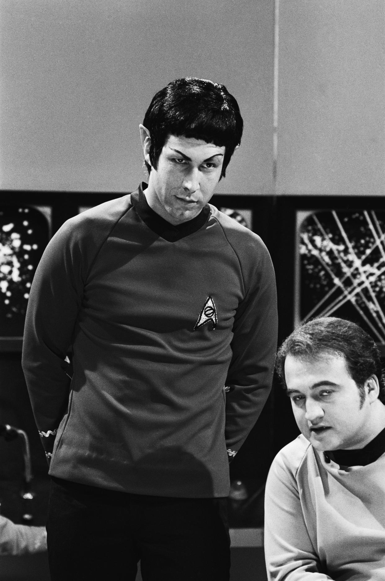 SATURDAY NIGHT LIVE -- Episode 22 -- Air Date 05/29/1976 -- Pictured: (l-r) Chevy Chase as Leonard Nimoy, Mr. Spock, John Belushi as William Shatner, Captain Kirk during 