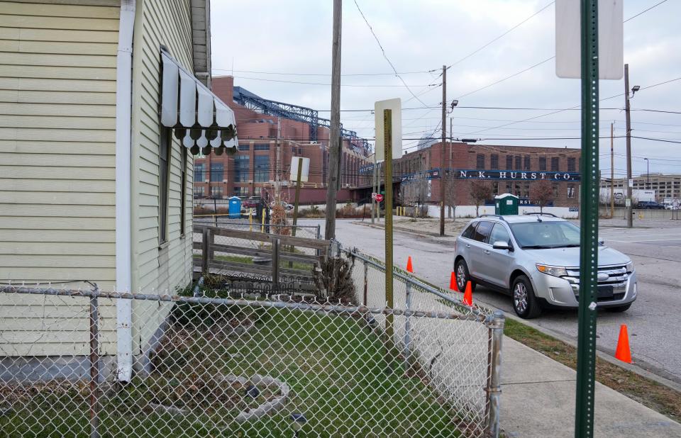 The home of Oretha Harris, just across the street from Lucas Oil Stadium and the N. K. Hurst company, on Wednesday, Dec. 6, 2023, in the Babe Denny neighborhood of Indianapolis. Hurst, which for many decades packaged beans in this site, has converted to an event space. Harris, who is 96-years-old, has no plans to sell her home to developers.