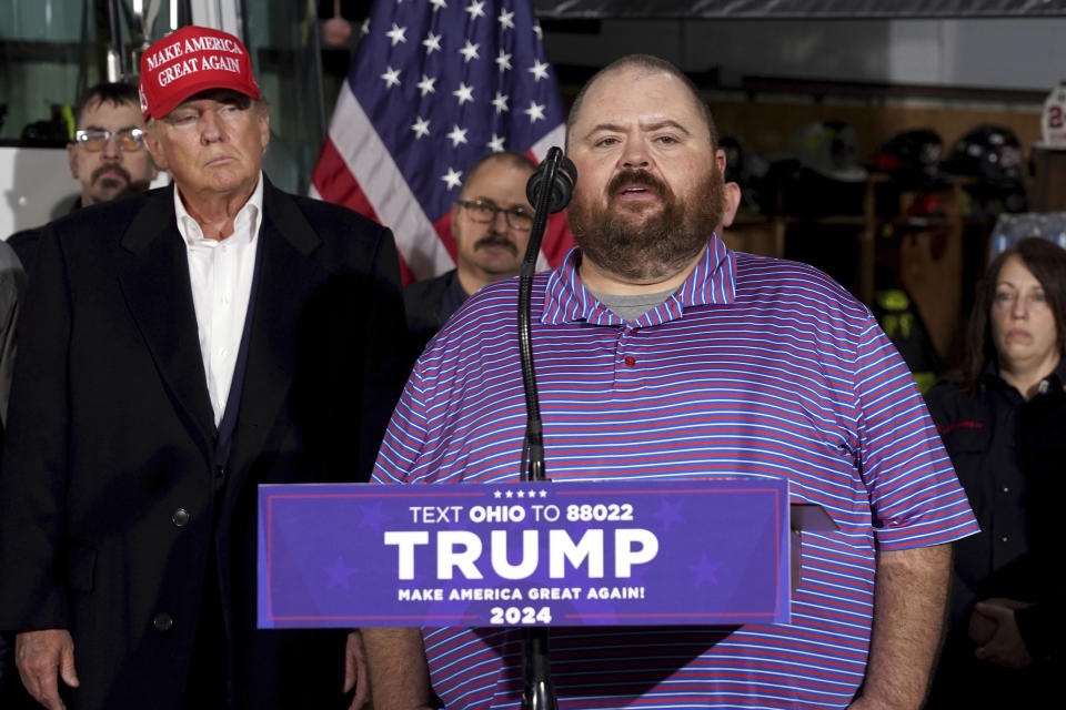 Mayor of East Palestine, Ohio, Trent Conaway speaks at the East Palestine Fire Department in front of former President Donald Trump as he visits the area in the aftermath of the Norfolk Southern train derailment Feb. 3 in East Palestine, Ohio, Wednesday, Feb. 22, 2023. (AP Photo/Matt Freed)