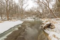 <p>The home sits on 6.82 acres and includes this gorgeous creek. </p>