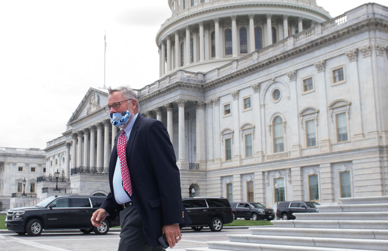 Sen. Burr leaves after a vote at the U.S. Capitol, May 14, 2020. (Photo by SAUL LOEB / AFP) 