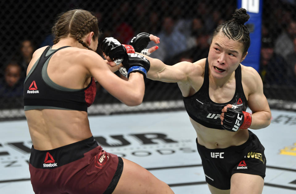 LAS VEGAS, NEVADA - MARCH 07: (R-L) Zhang Weili of China punches Joanna Jedrzejczyk of Poland in their UFC strawweight championship fight during the UFC 248 event at T-Mobile Arena on March 07, 2020 in Las Vegas, Nevada. (Photo by Jeff Bottari/Zuffa LLC)