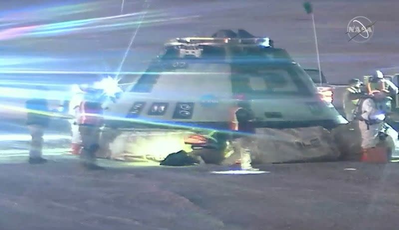 Boeing Starliner space capsule checked after landing at White Sands