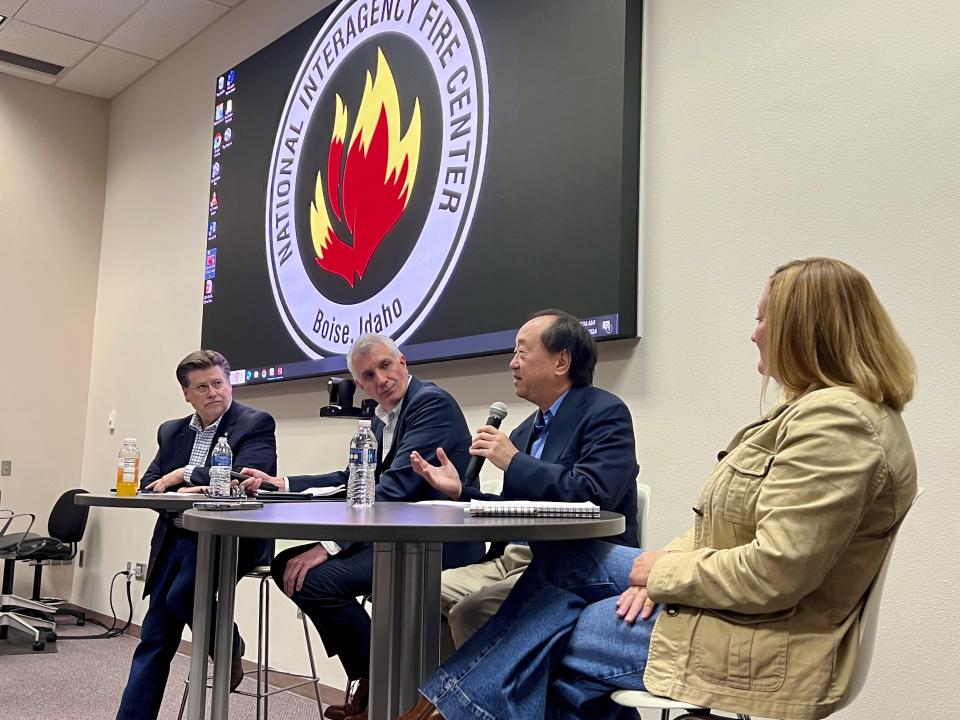 Idaho Department of Insurance Director Dean Cameron, left, Colorado Deputy Insurance Commissioner Jason Lapham, center left, Hawaii Insurance Commissioner Gordon Ito, center right, and Texas Insurance Commissioner Cassie Brown, right, discuss the impacts major wildfires have had on property insurance costs and availability in their states at the National Interagency Fire Center in Boise, Idaho, Monday, April 29, 2024. (AP Photo/Rebecca Boone)