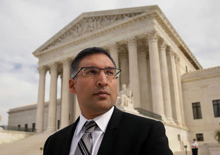 Attorney Neal Katyal is seen in front of the U.S. Supreme Court building after arguing a case before the court in Washington, November 2014. REUTERS/Gary Cameron