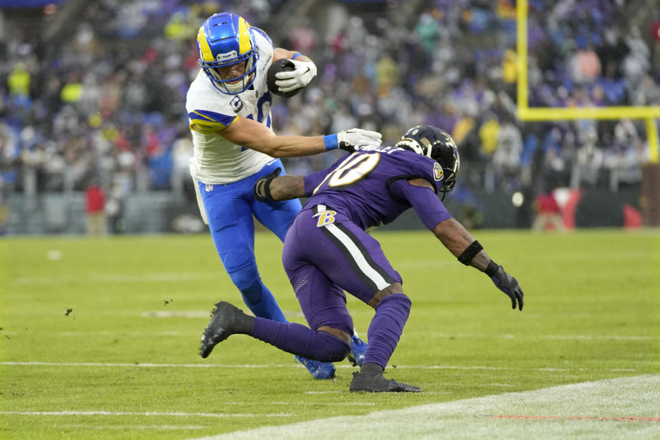 Los Angeles Rams wide receiver Cooper Kupp, left, tries to get past Baltimore Ravens cornerback Arthur Maulet (10) during the second half of an NFL football game Sunday, Dec. 10, 2023, in Baltimore. (AP Photo/Alex Brandon)