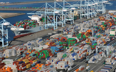FILE PHOTO: Shipping containers sit at the ports of Los Angeles and Long Beach, California in this aerial photo taken February 6, 2015. REUTERS/Bob Riha, Jr./File Photo