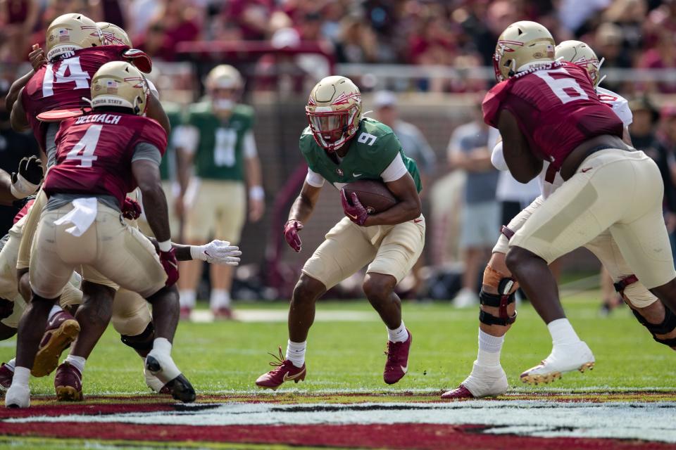 Florida State Seminoles running back Lawrance Toafili (9) makes his way down the field. Seminole fans watched as the Florida State football team hosted the FSU Garnet and Gold Spring Showcase on Saturday, April 15, 2023. 