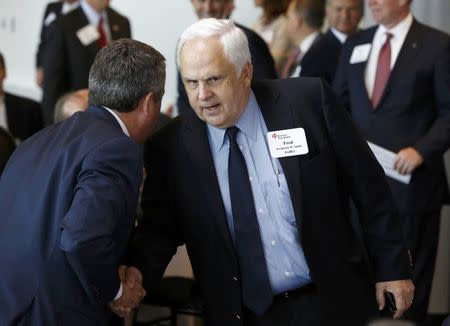 FILE PHOTO - Fedex CEO Fred Smith is pictured at a business roundtable meeting of company leaders and U.S. Republican Presidential candidate Mitt Romney in Washington, June 13, 2012. REUTERS/Jason Reed/File Photo