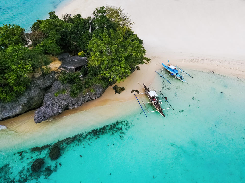 Blue waters off a tiny island