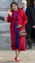 One of our favourite looks to date was this colour-blocking ensemble by Meghan's go-to Canadian labels. Kick-starting 2019 in style, the Duchess of Sussex broke her navy streak in a traffic light red Sentaler coat teamed with a purple midi dress by Aritzia’s Babaton. Clashing Stuart Weitzman heels finished the look. <em>[Photo: Getty]</em>