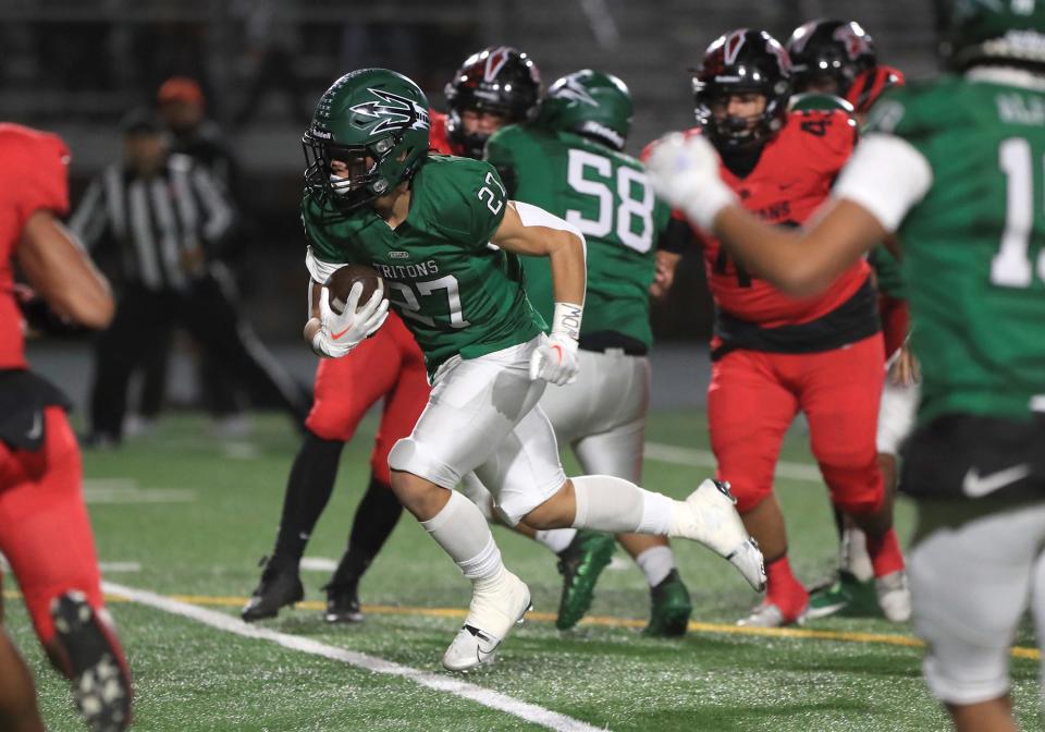 Pacifica's Philip Kim finds an opening in Rio Mesa's defense during the first quarter of their CIF-SS Division 4 first-round playoff game at Pacifica High on Friday, Nov. 4, 2022. Pacifica won 34-7.