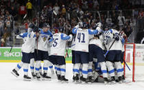 Ice Hockey World Championships - Semifinals - Russia v Finland - Ondrej Nepela Arena, Bratislava, Slovakia - May 25, 2019 Finland's players celebrate after winning the match. REUTERS/David W Cerny