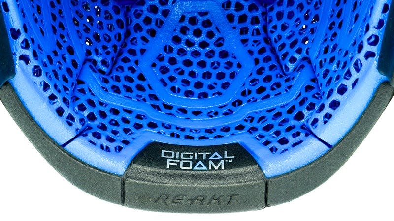 A close-up of the lattice structure of a custom EOS 3D-printed insert inside a Bauer hockey helmet.
