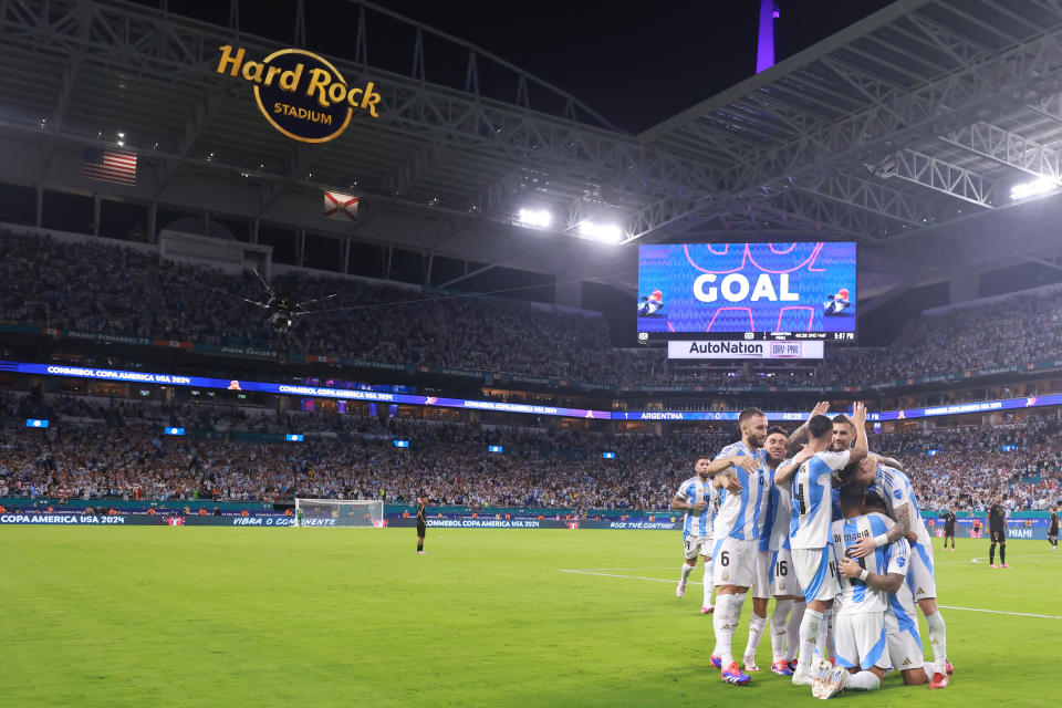 Argentina celebrates during a group stage match at Miami's Hard Rock Stadium, where they'll also play Sunday's final. (Hector Vivas/Getty Images)