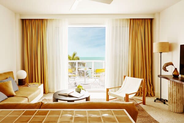 The suites are curated with ’60s and ’70s furniture and art and a beachy color palette.