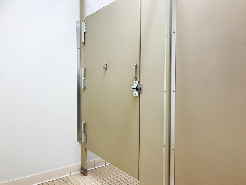 bathroom stalls in a public bathroom