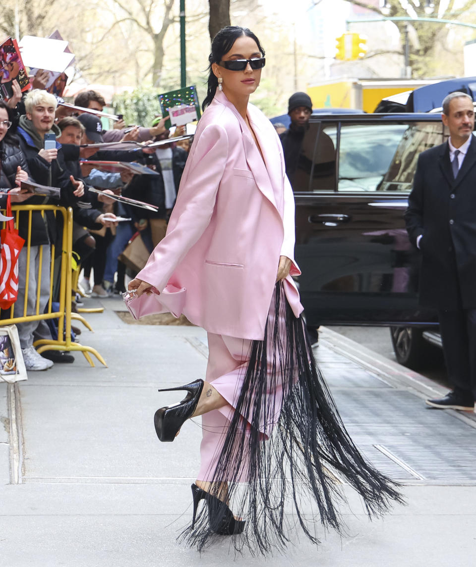 <p>Katy Perry dresses up in pink and black for an appearance on <em>The View</em> in New York City on March 28.</p>