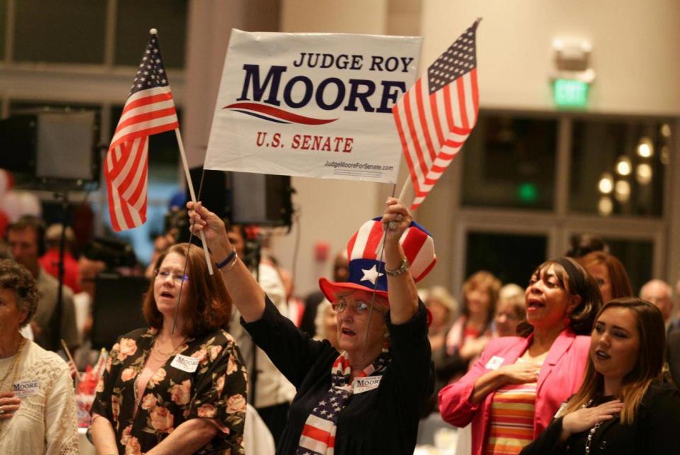 Moore's supporters include hardcore Christian conservatives (Reuters)