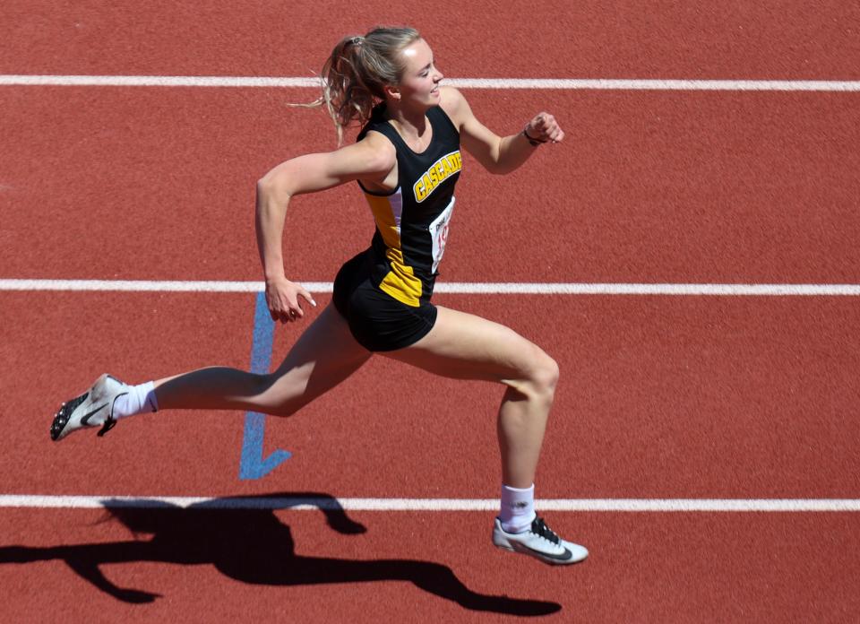 Cascade's Emma Gates crosses the finish in the girls 4a 100 meter dash during the Oregon State Track and Field Championships at Hayward Field in Eugene, Ore. on Saturday, May 21, 2022.