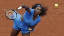 Tennis - French Open - Roland Garros - Serena Williams of the U.S. vs Teliana Pereira of Brazil - Paris, France - 26/05/16. Williams serves. REUTERS/Gonzalo Fuentes