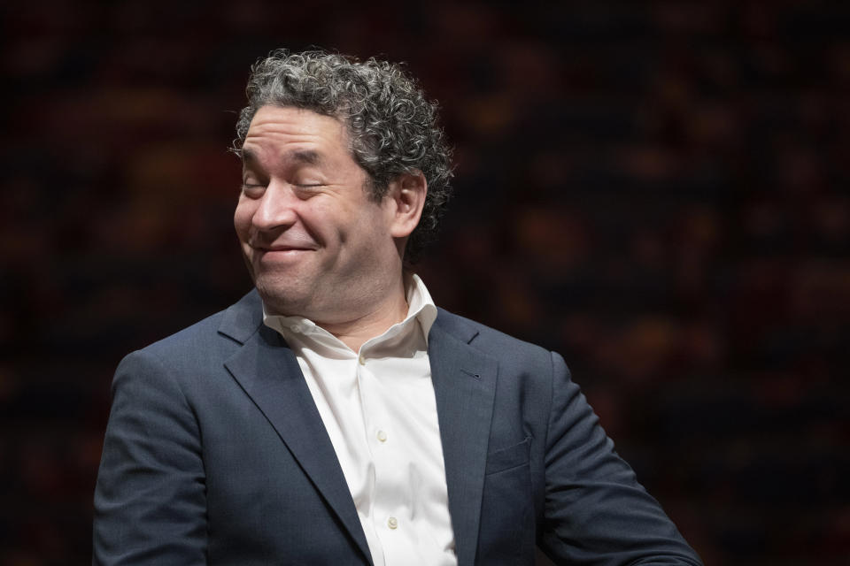 Gustavo Dudamel is introduced as the New York Philharmonic's 27th music and artistic director, Monday, Feb. 20, 2023, in the newly renovated David Geffen Hall at Lincoln Center for the Performing Arts in New York. (AP Photo/John Minchillo)