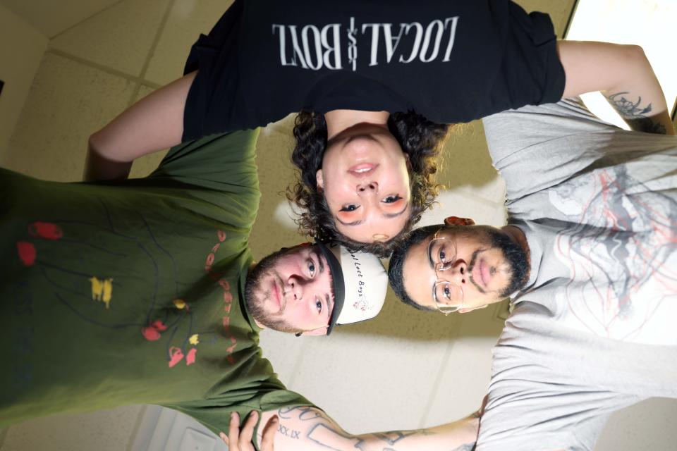 From left, Devin Ryan, Kariana Santos and Jared Shanks model Local Lost Boyz clothing, a Brockton urban streetwear brand, on Saturday, June 4, 2022.